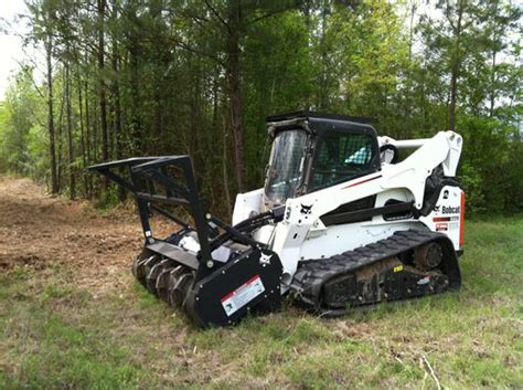 bobcat skid steer clearing land|land clearing equipment videos.